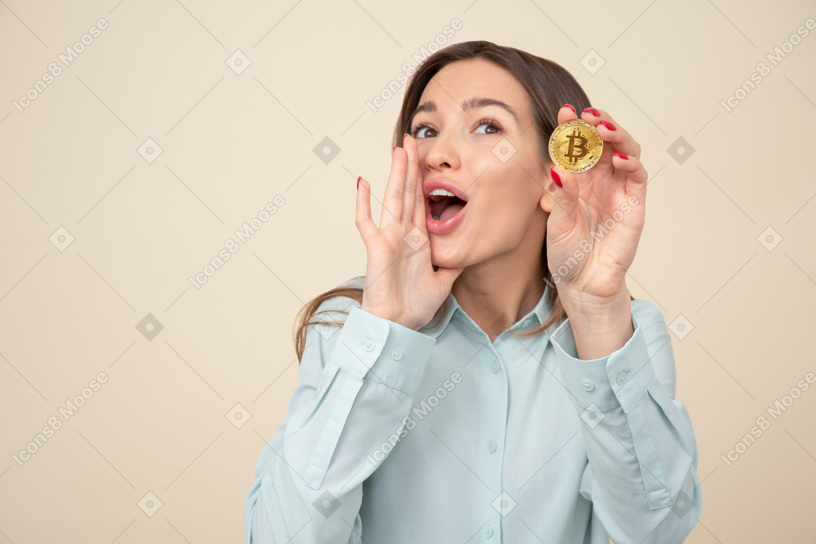 Attractive young girl holding bitcoin and screaming something