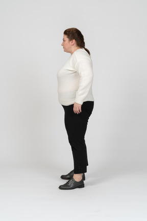 Side view of a plump woman in casual clothes