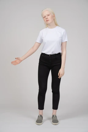 Front view of a young girl raising left arm