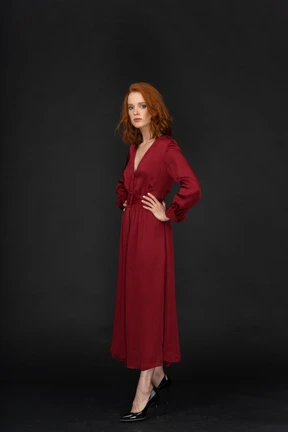 Ginger young lady in red dress
