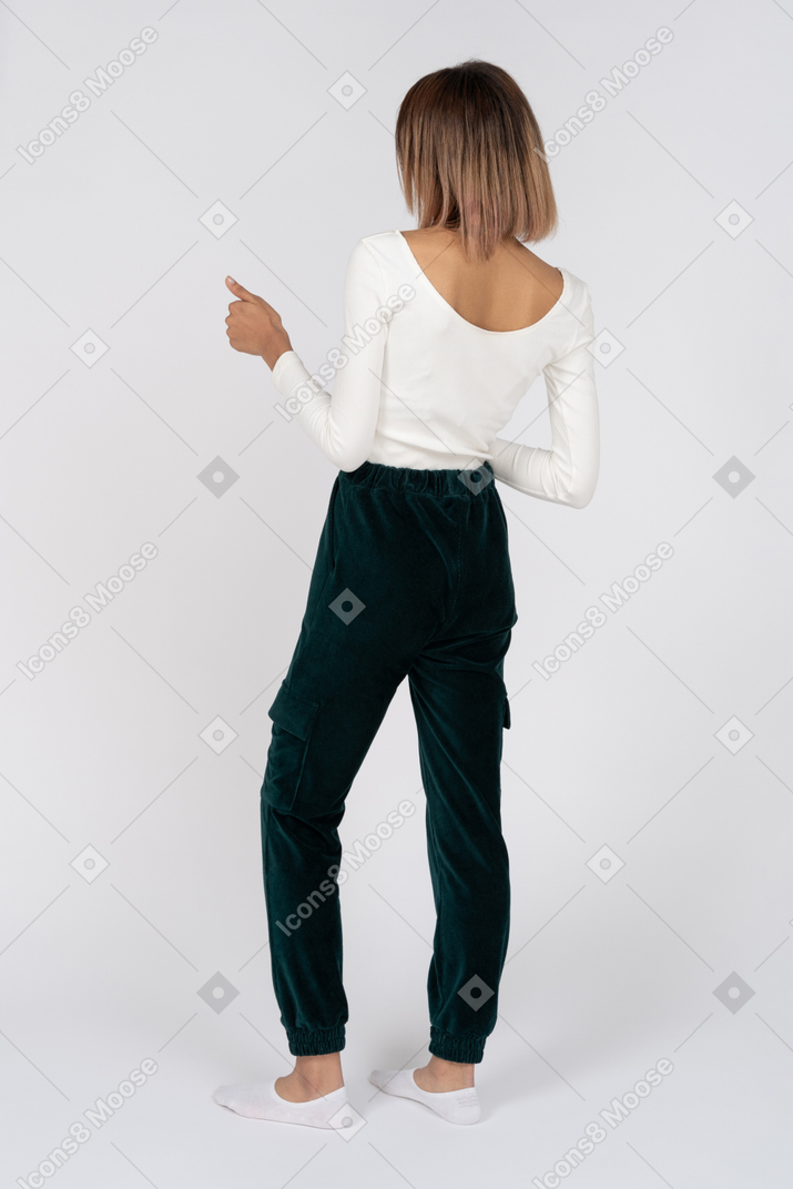 Woman in casual clothes standing