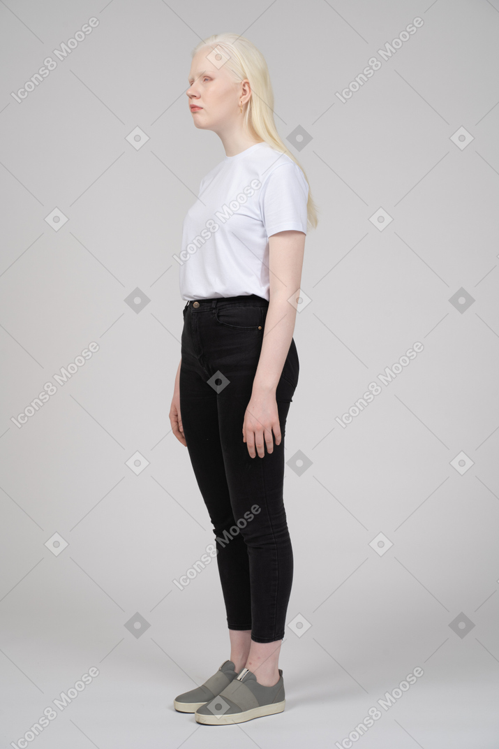 Young woman standing and looking away