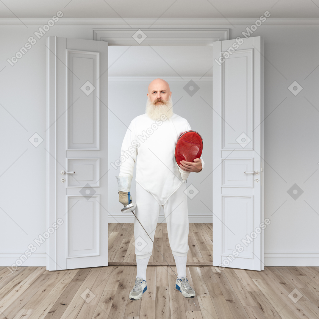 Fencer with a helmet in his hands