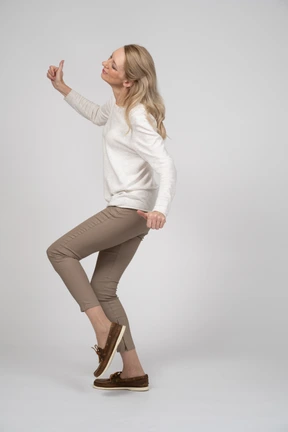 Woman in casual clothes posing