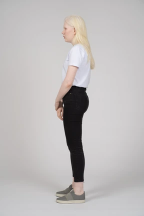 Profile view of a woman in casual clothes looking away