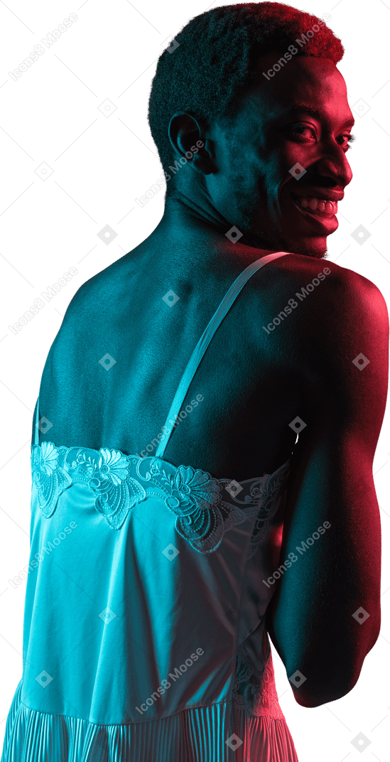 Young black man in nightie smiling