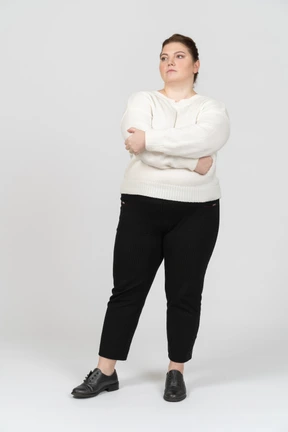 Confident plump woman in casual clothes