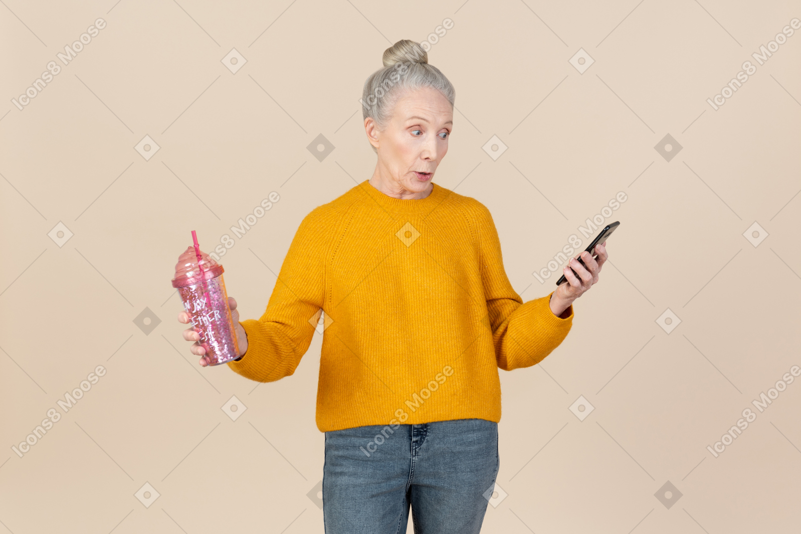 Old woman holding cup and looking on phone