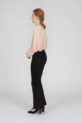 Woman in beautiful blouse standing