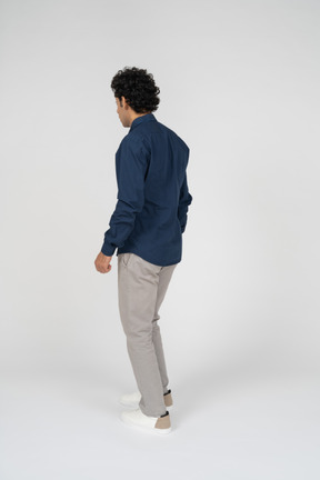 Rear view of a man in casual clothes