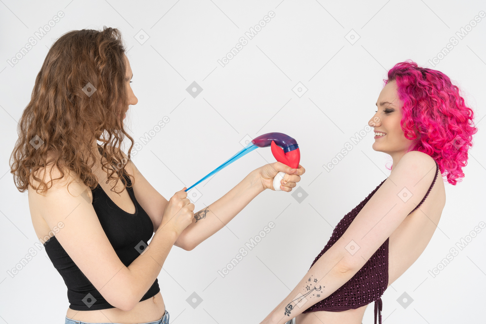 Young girl threatening her sister