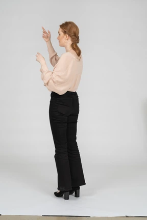 Woman in beautiful blouse jumping