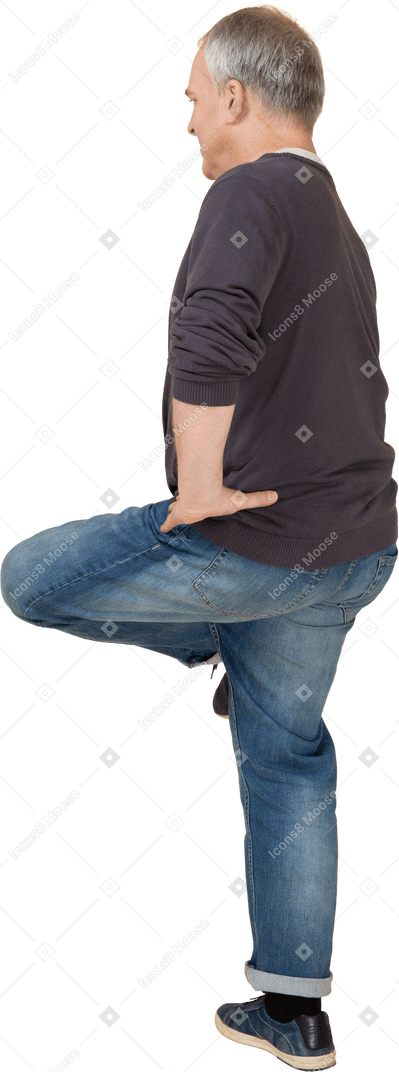 Man in casual clothes posing