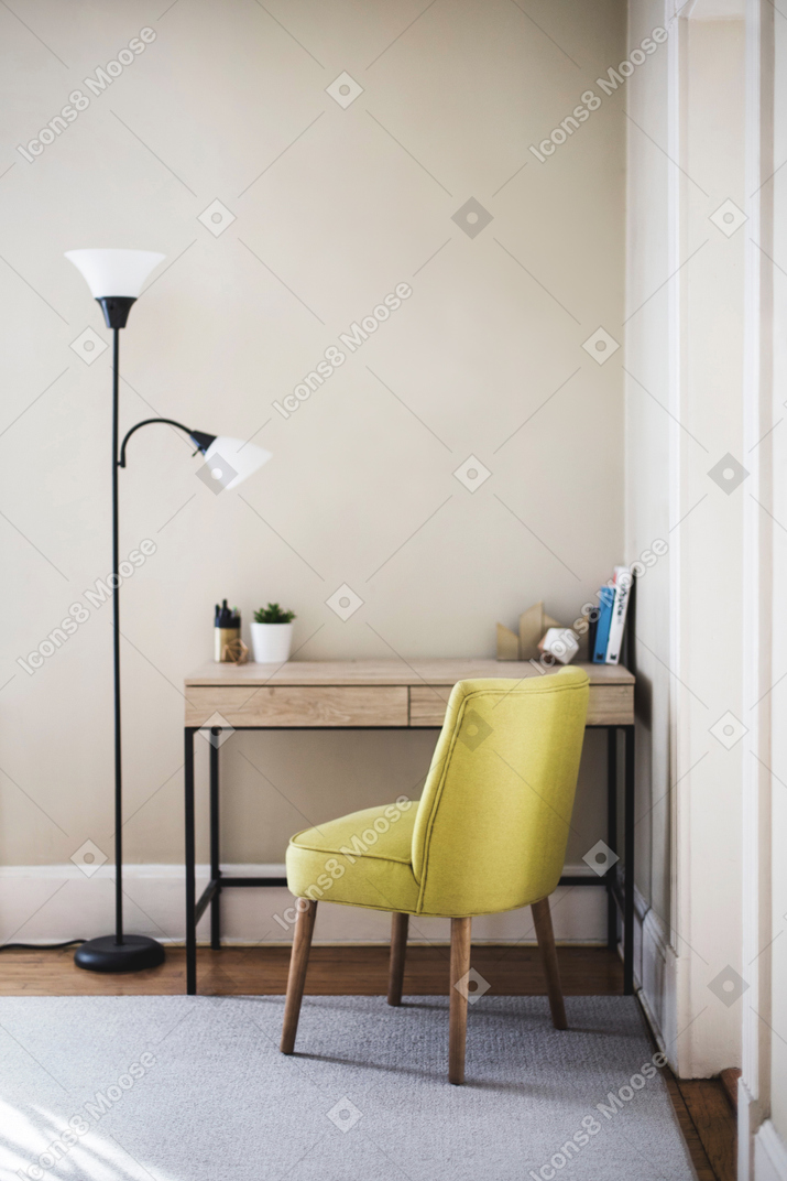 White chair next to table