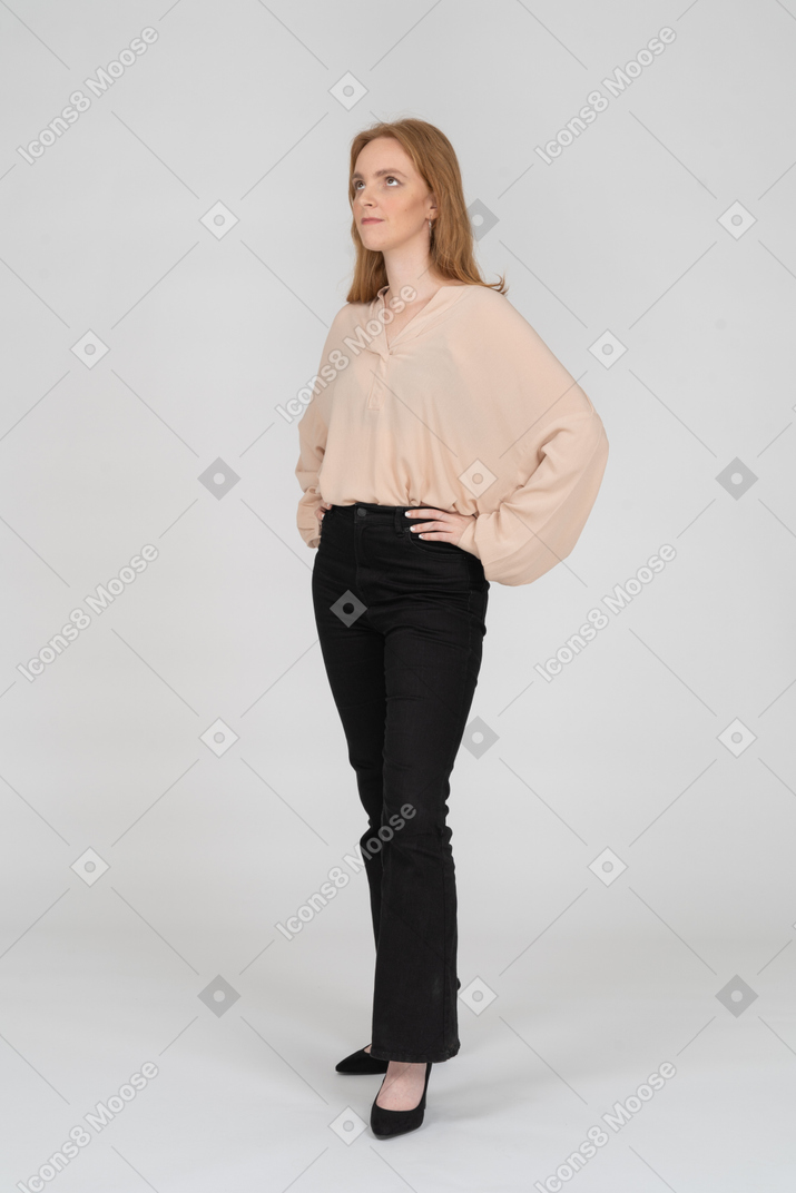 Woman in beautiful blouse standing