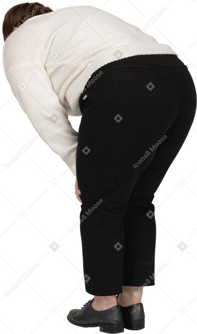 Rear view of plump woman bending down
