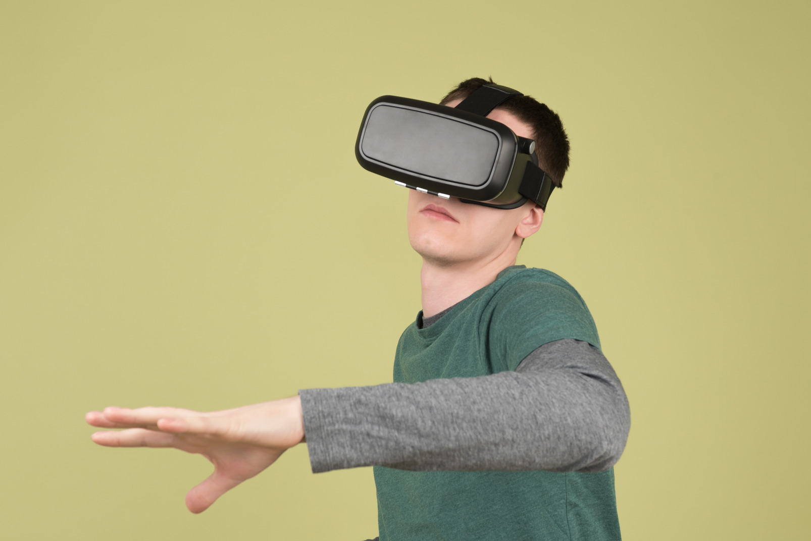 Young man wearing a virtual reality headset