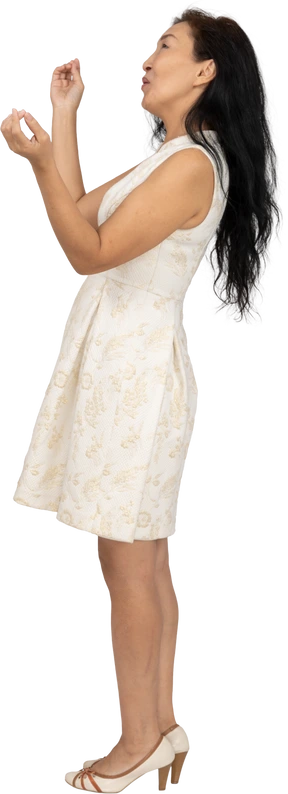 Woman in beautiful dress standing