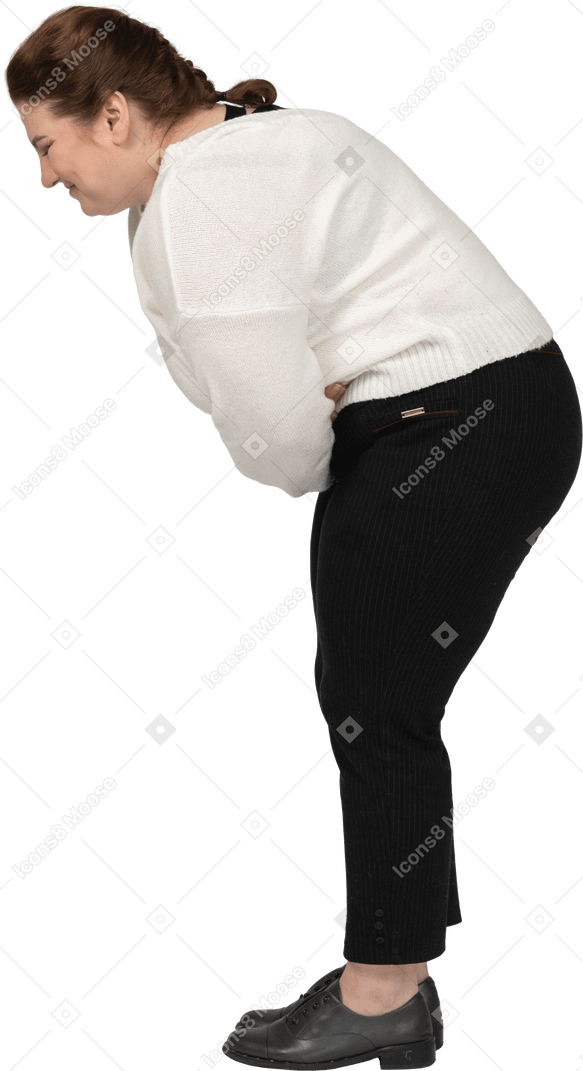 Plus size woman in casual clothes suffering from stomachache