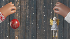 Hands holding christmas ornaments