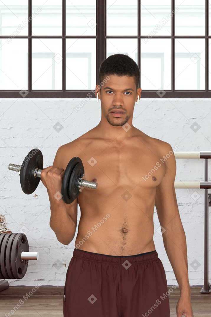 Man lifting weights in a gym
