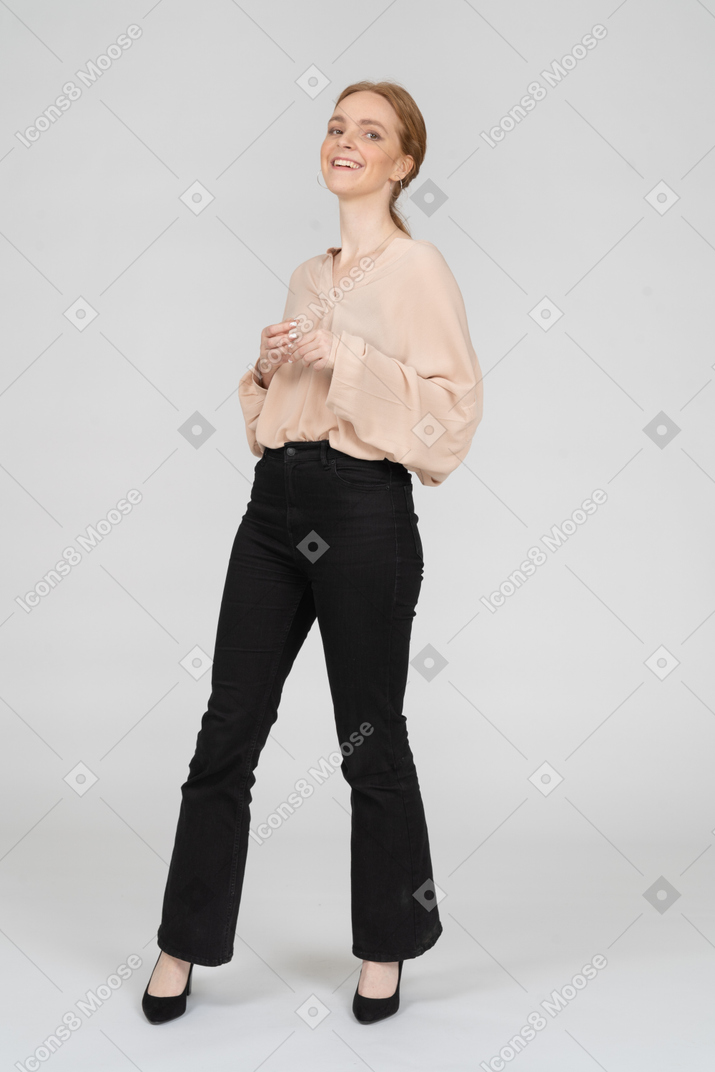 Woman in beautiful blouse standing