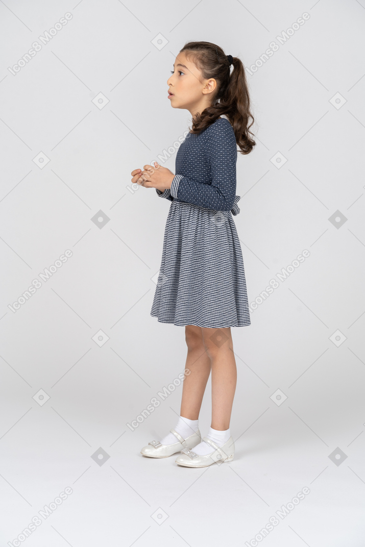 Side view of a girl looking agitated