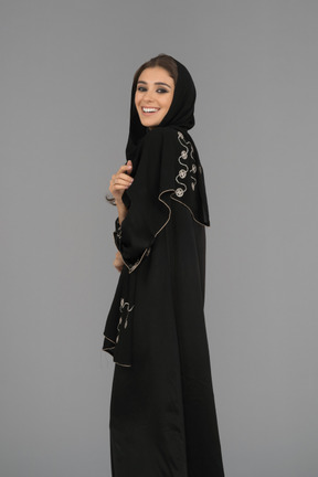 Cheerful arab woman looking at camera
