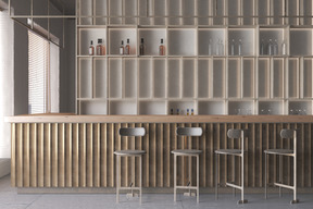 Long bar counter with high stools in an empty cafe