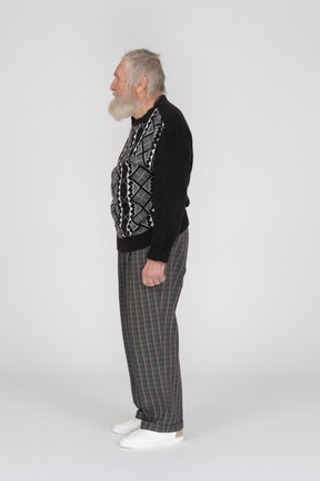 Side view of an old man standing