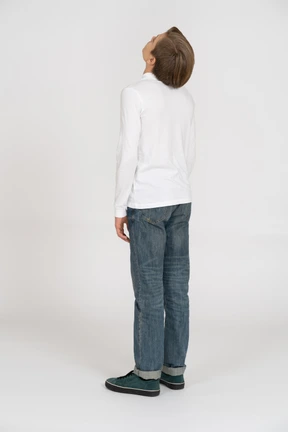 Young man in casual clothes standing