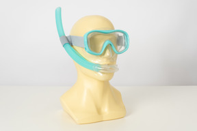 Swimming goggles on a mannequin head