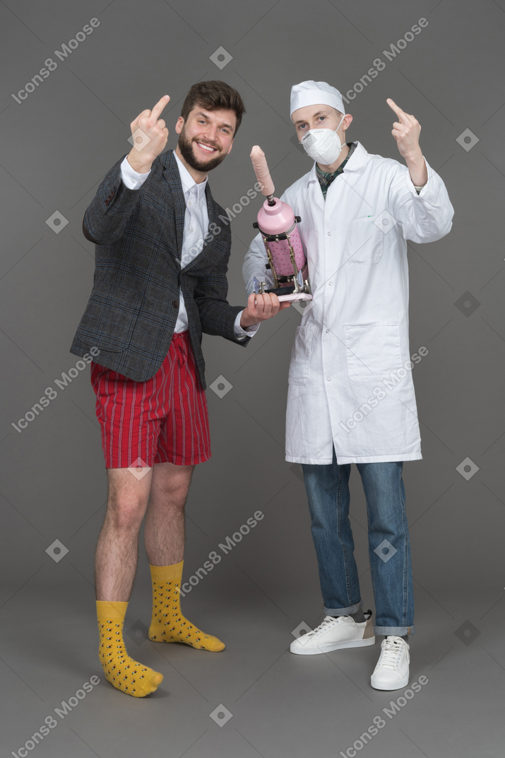 Young man and doctor showing middle finger