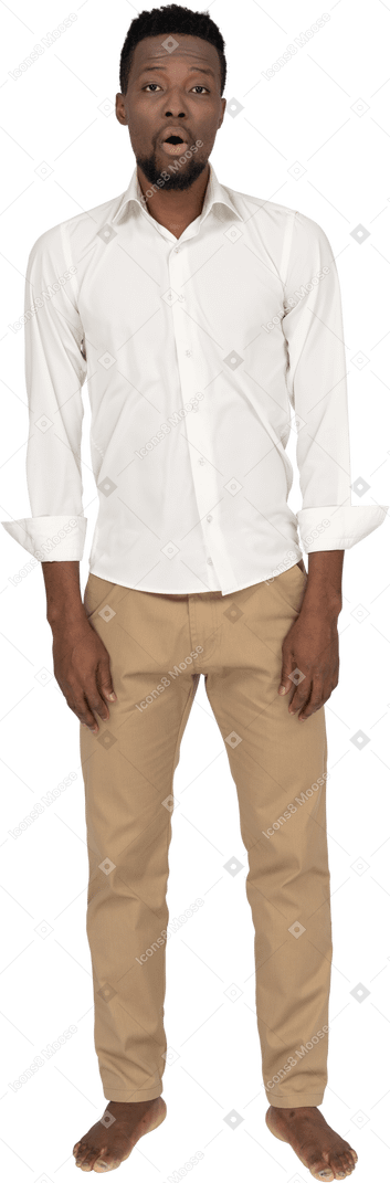 Man in white shirt standing