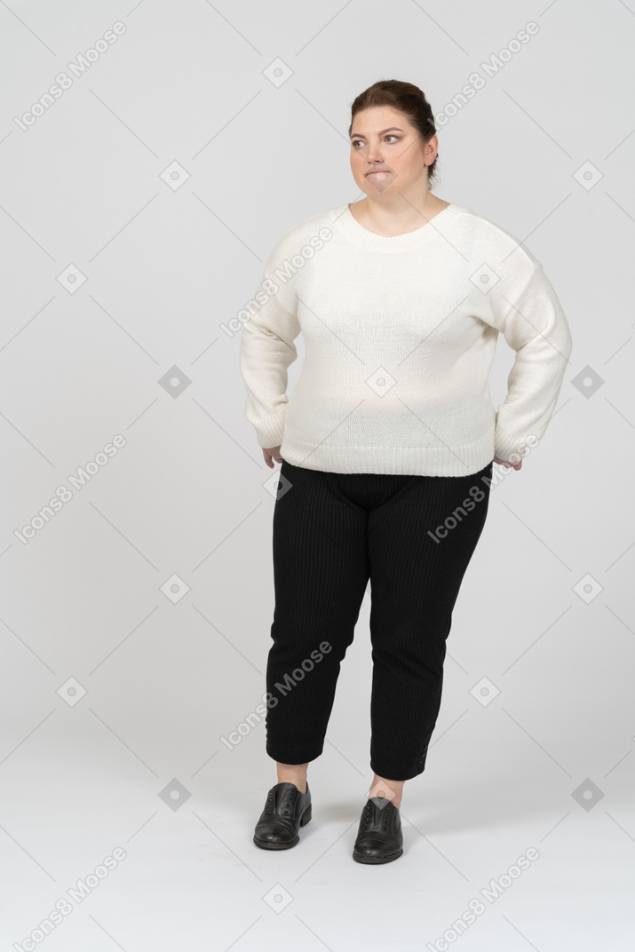 Plump woman in white sweater