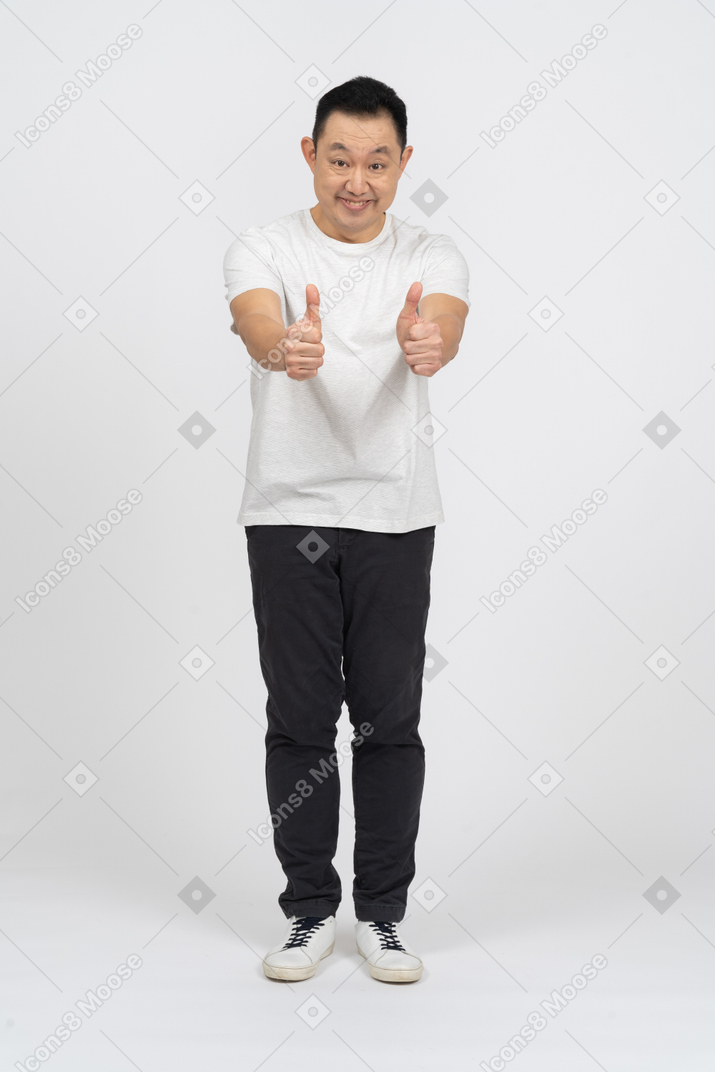 Happy man showing thumbs up