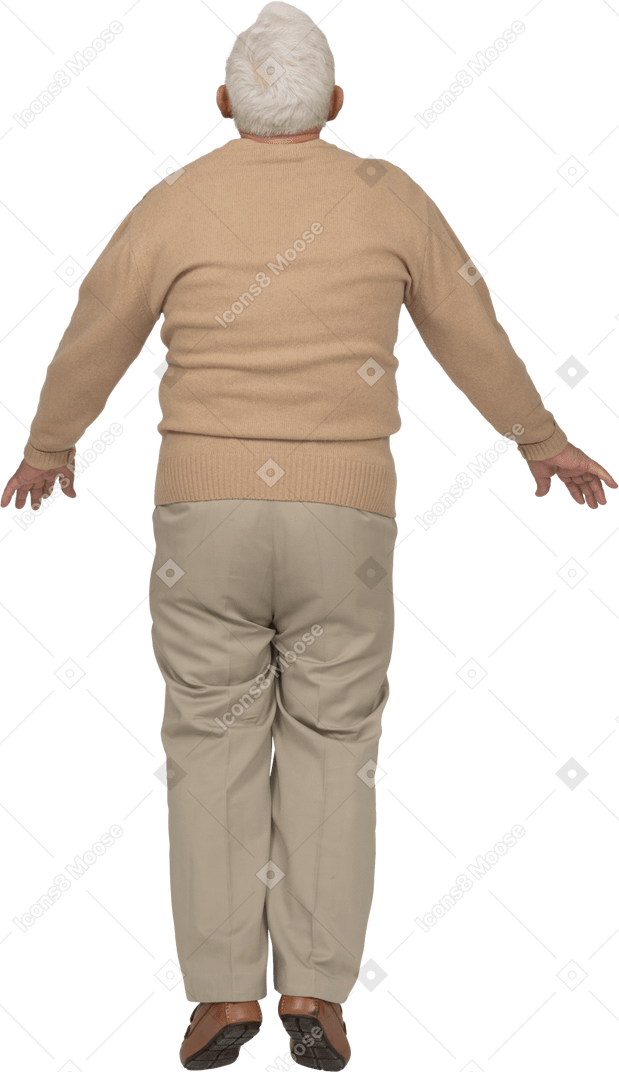 Вид сзади на старика в повседневной одежде, прыгающего