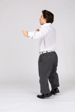Side view of young man in motion