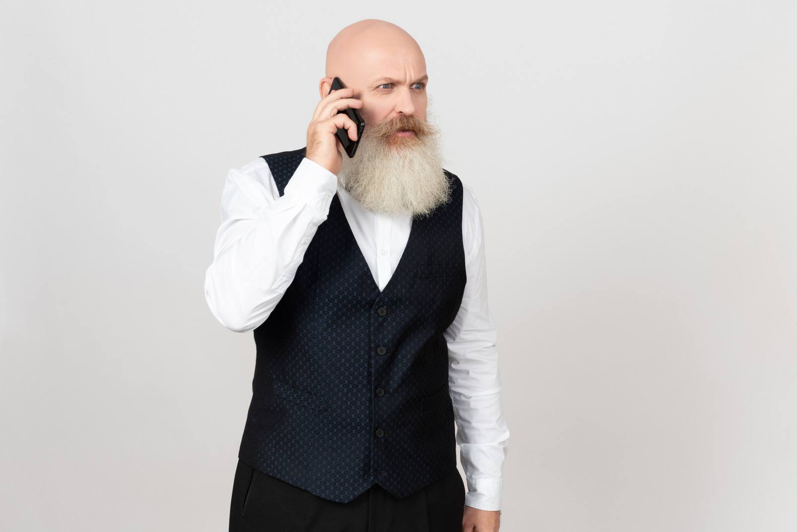 Aged man involved in phone conversation