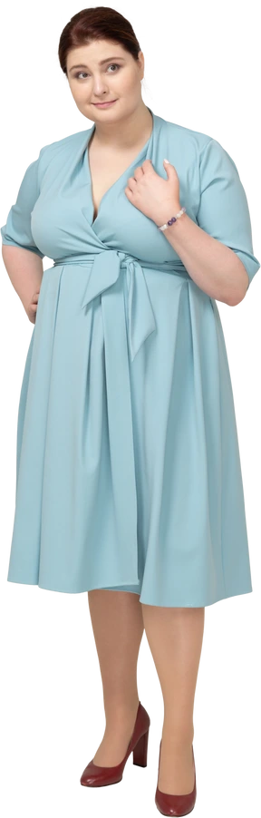 Front view of a woman in blue dress