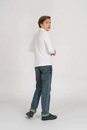 Young man in casual clothes standing