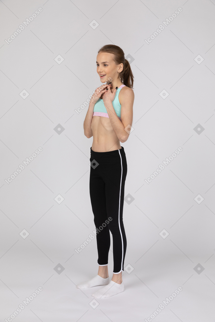 Surprised teen girl in sportswear