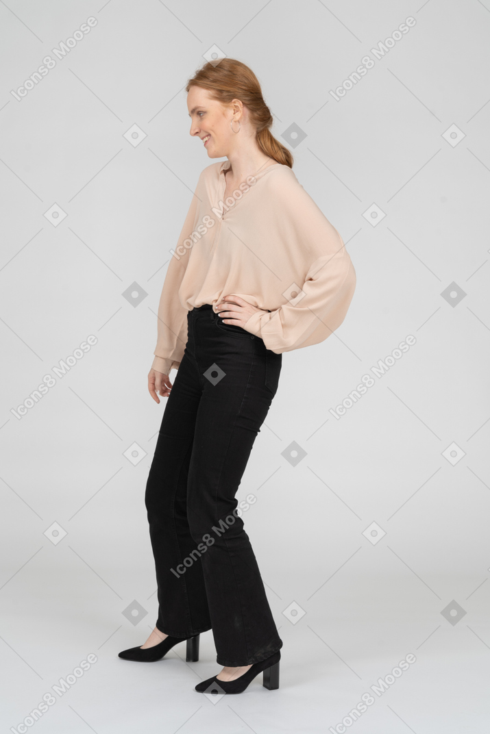 Woman in beautiful blouse standing