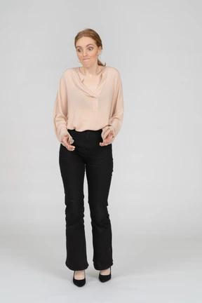 Woman in beautiful blouse standing