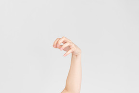 Female hand showing kind of scary gesture