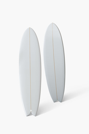 Two white surfboards on white background