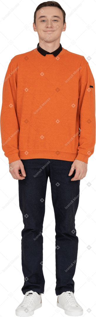 Young man in orange sweatshirt standing