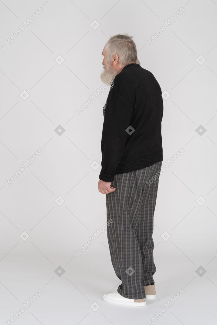 Side view of a standing old man