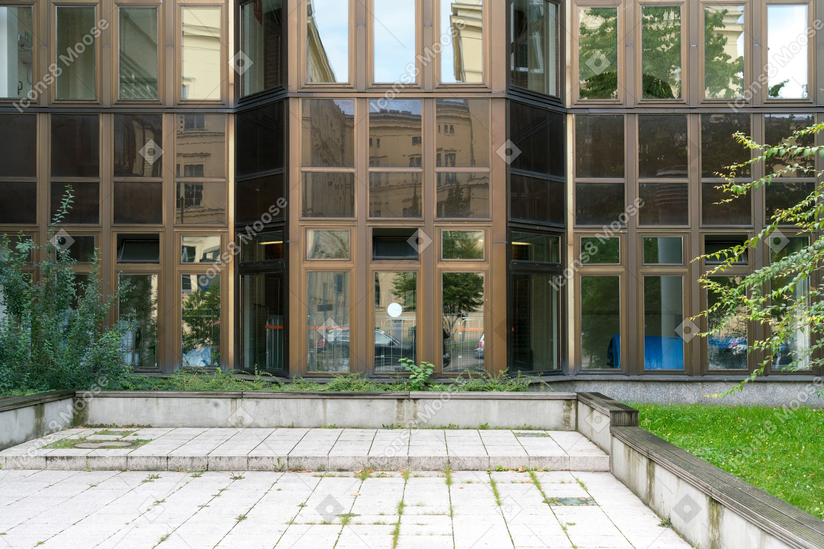 A modern office building with an empty parking lot