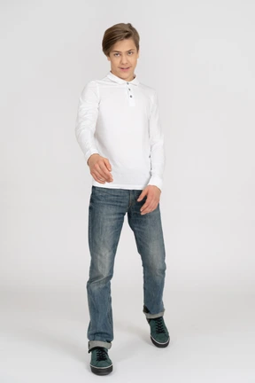 Young man in casual clothes standing